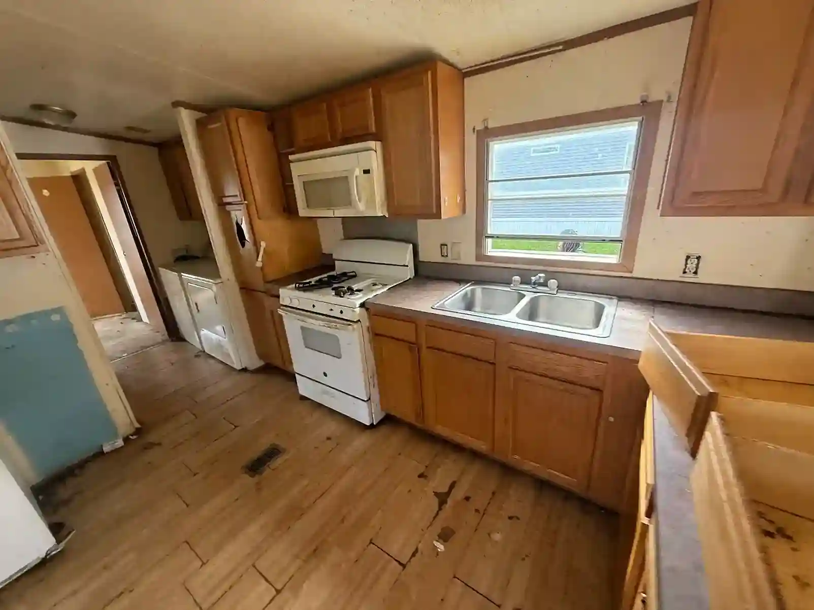 Mostly cleared kitchen interior